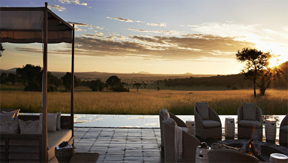 World's-Best-Safari-Lodges-Sinigta-Serengeti-House-Bonfire-and-Sunset
